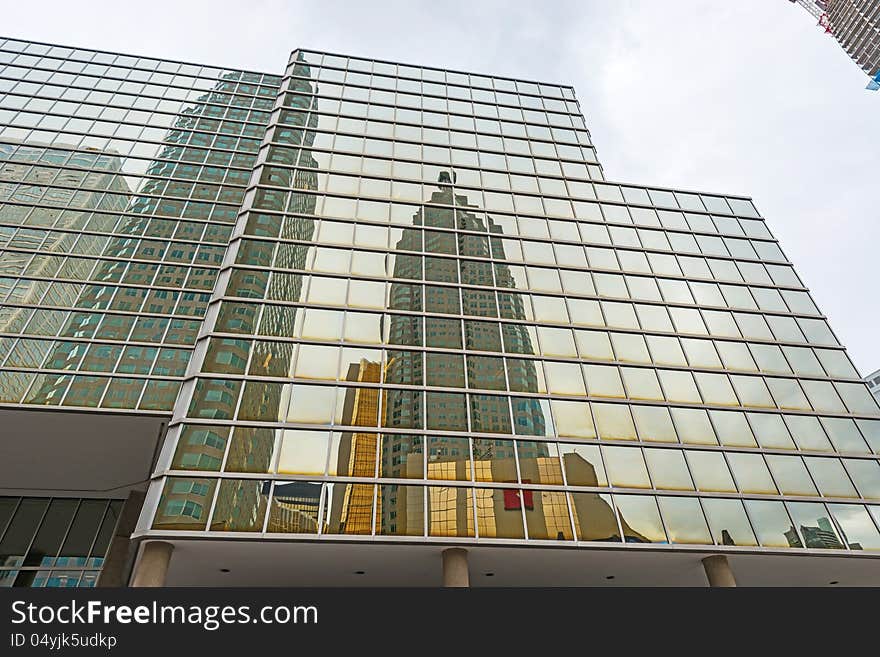 Toronto skyscrapers reflection on glass windows on Bay st. Toronto skyscrapers reflection on glass windows on Bay st