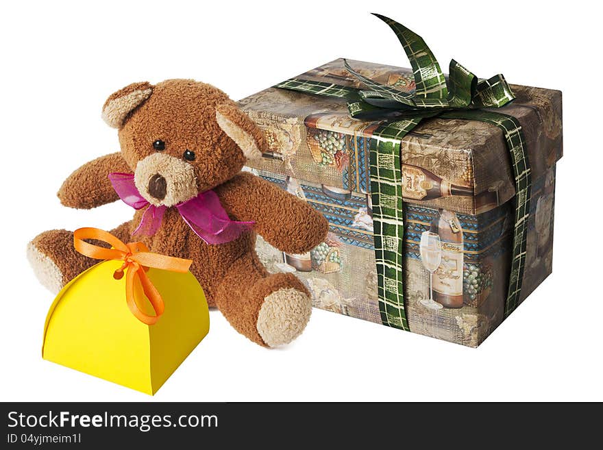 Teddy bear with a cardboard gift box