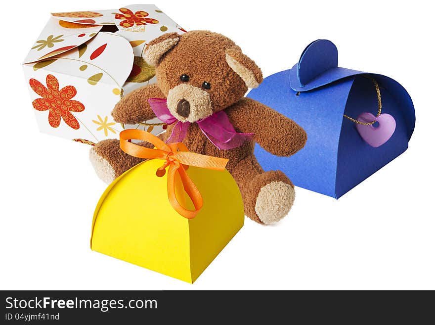 Teddy bear with a cardboard gift box