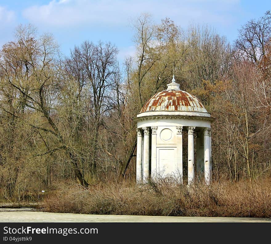 Old gazebo in  the spring forest