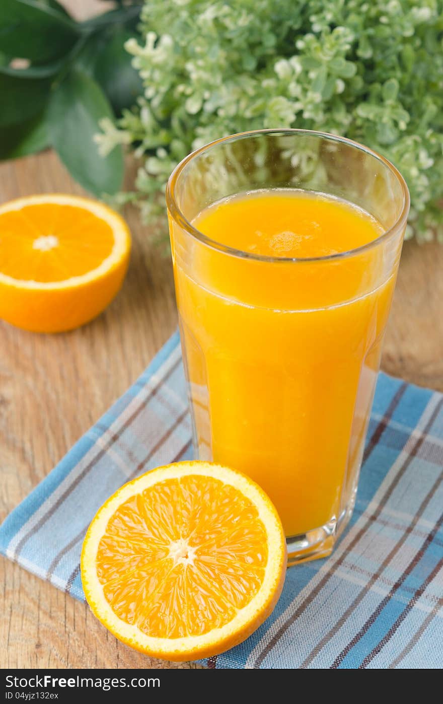 Glass Of Orange Juice And Oranges