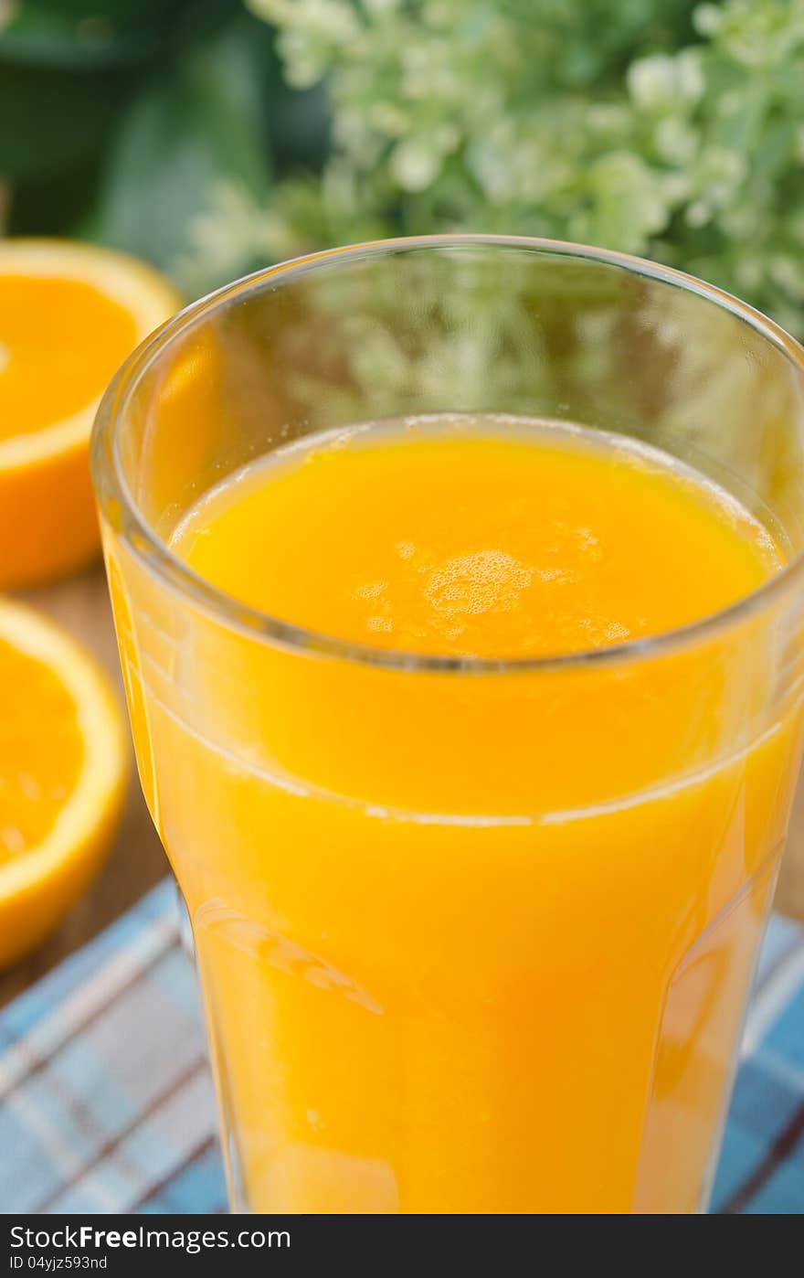 Glass of orange juice closeup