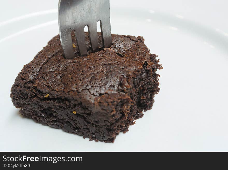 Chocolate brownie with fork