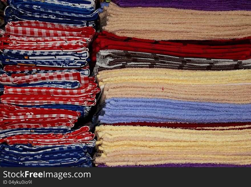 Colorful towels folded and stacked