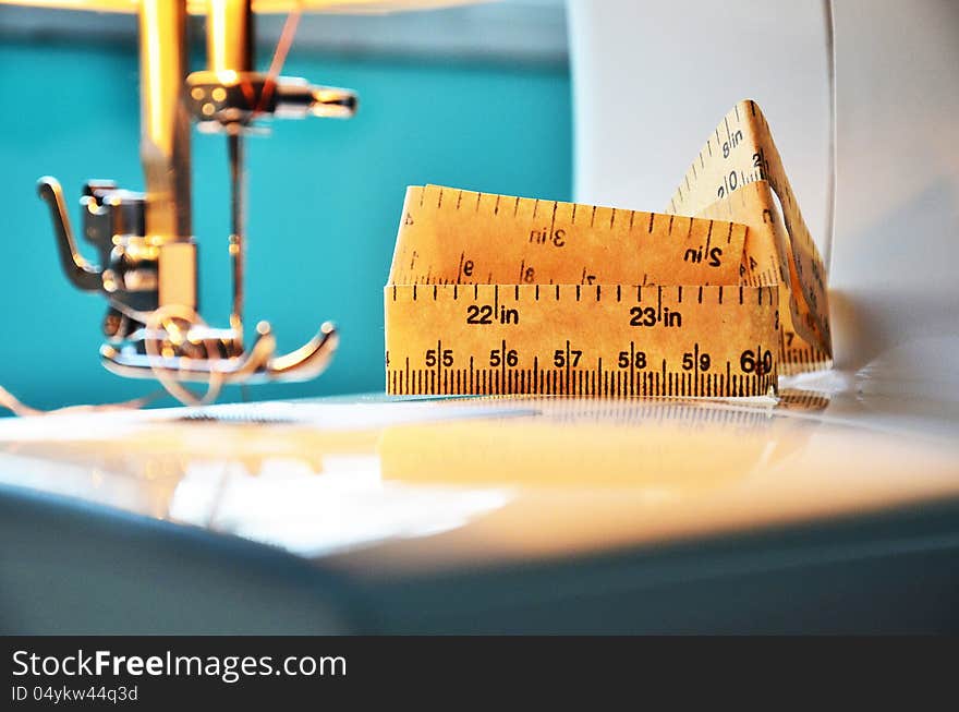 Photo of a sewing machine  and tailoring meter