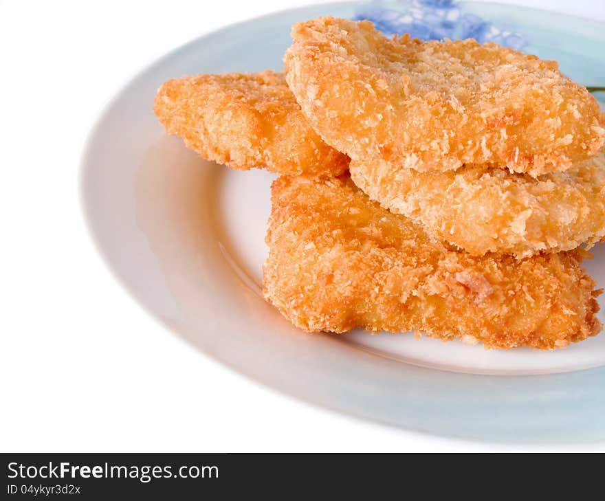 Fish sticks in dish on a white background