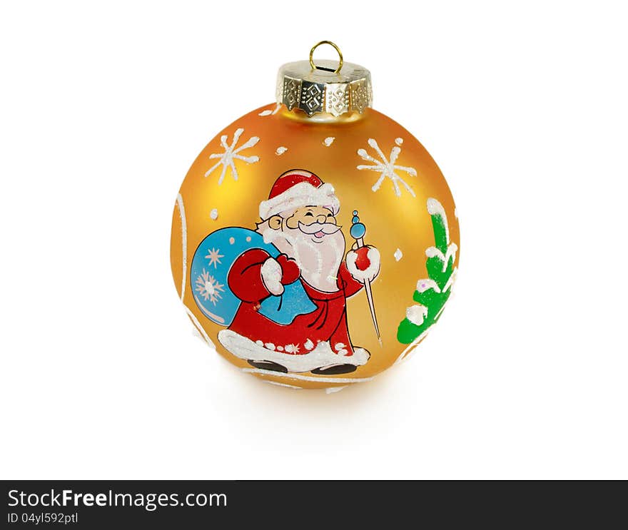 The photo shows a one yellow decorative ball for Christmas tree decoration,  on white background. On the toy depicts Santa Claus with a bag of gifts. The photo shows a one yellow decorative ball for Christmas tree decoration,  on white background. On the toy depicts Santa Claus with a bag of gifts.