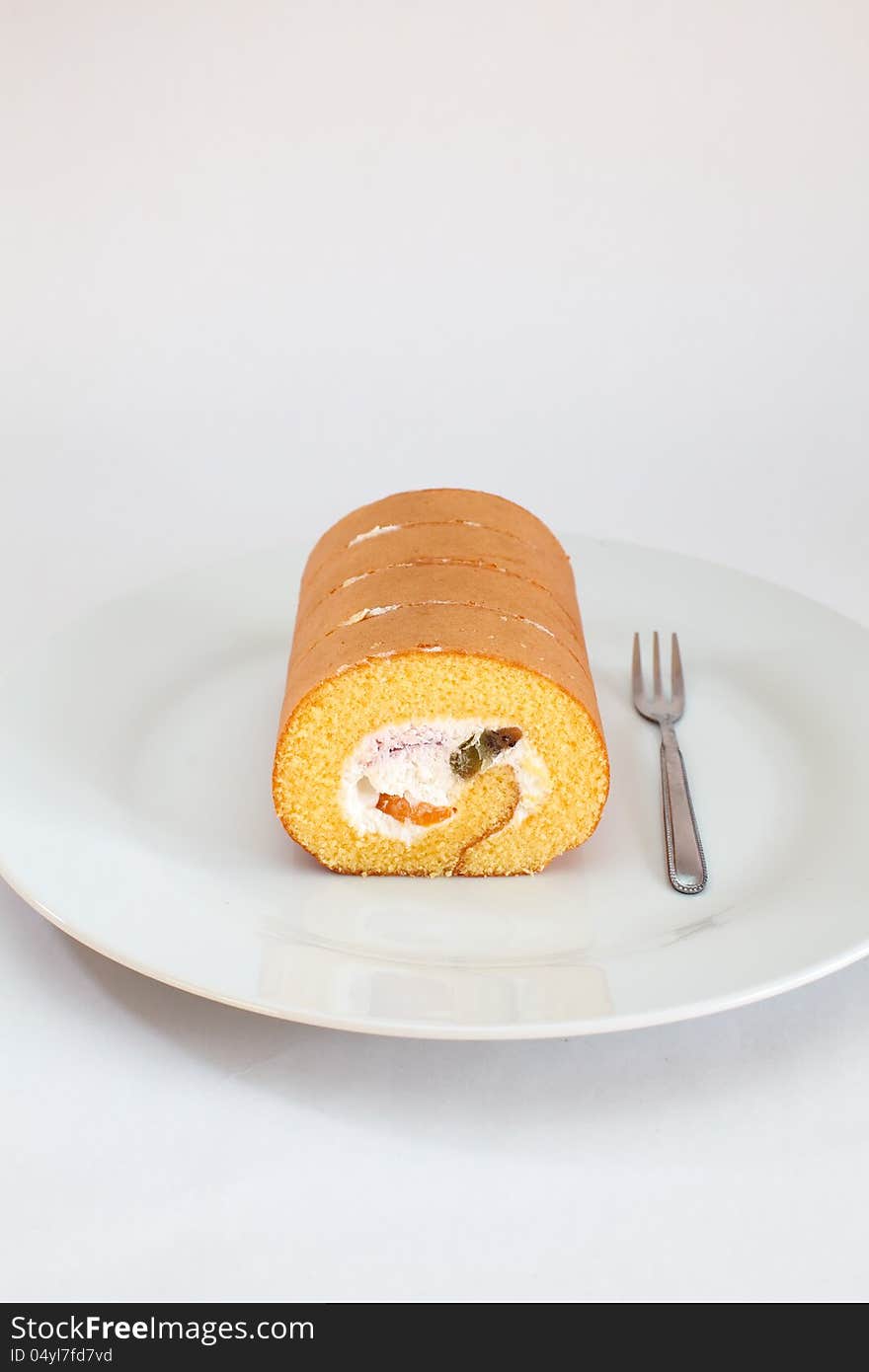 Roll cake on white background