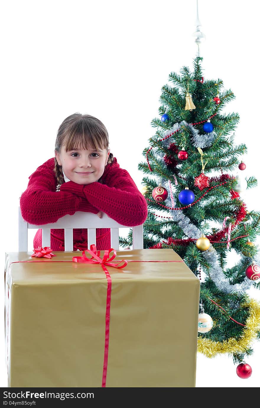 Cute happy child girl with big Christmas present. Cute happy child girl with big Christmas present