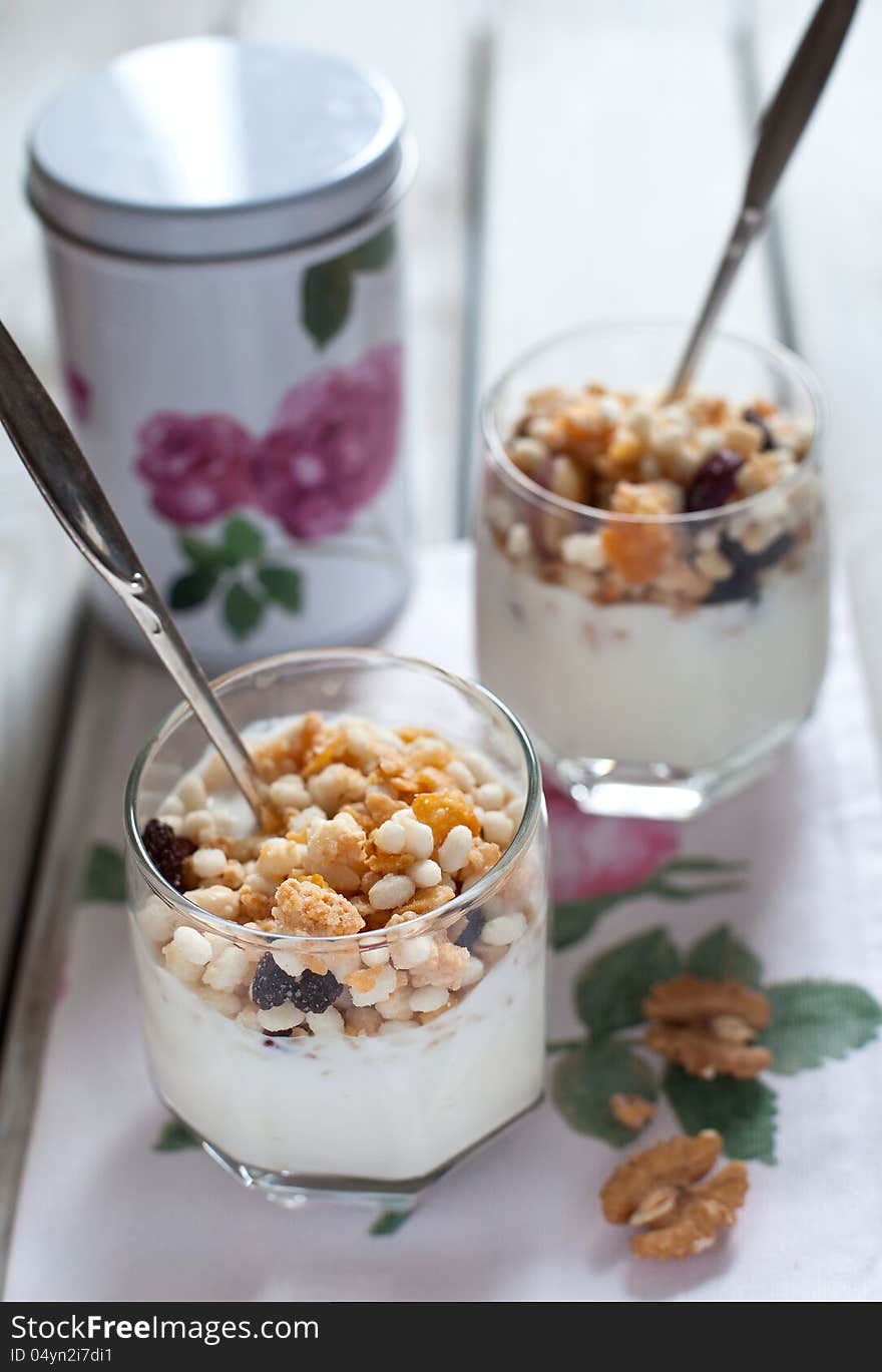 Gluten free muesli with natural yogurt in glasses