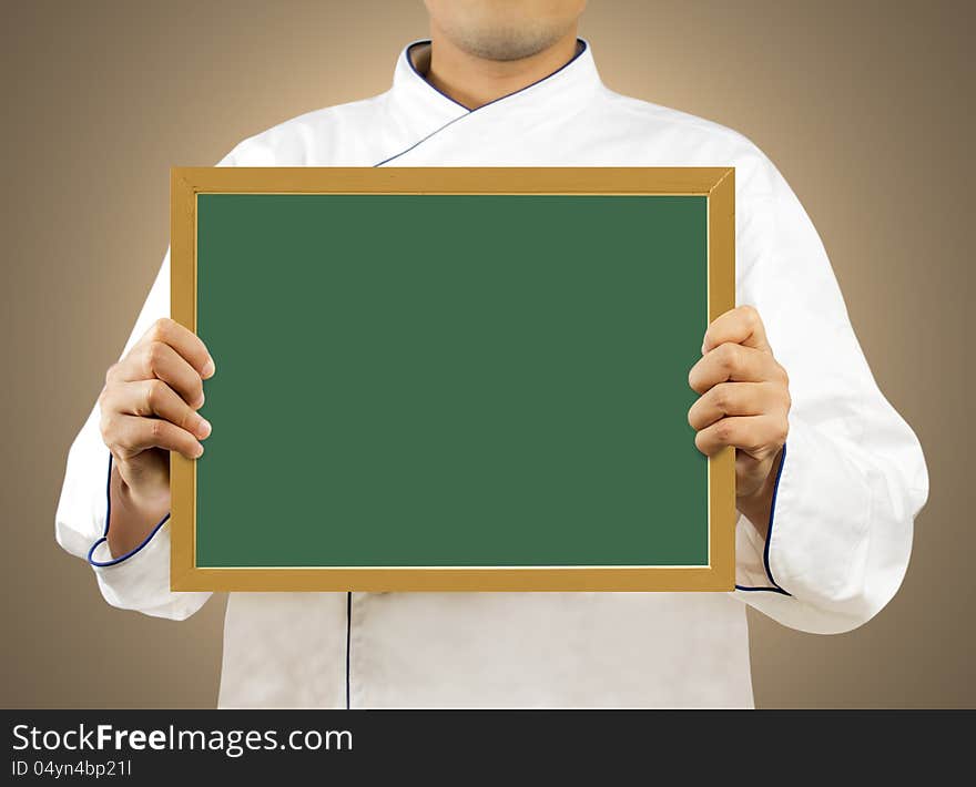 Chef showing blank chalkboard, Display the menu. Chef showing blank chalkboard, Display the menu