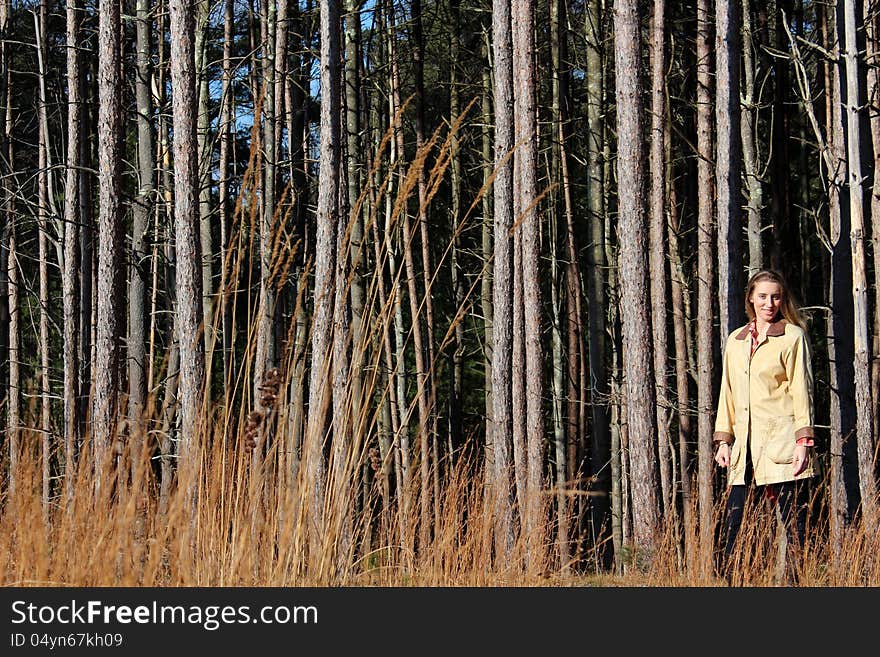 Pretty blonde woman out in the woods