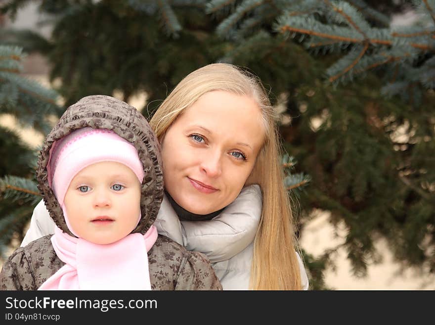 Portrait of the beautiful mother with her lovely daughter