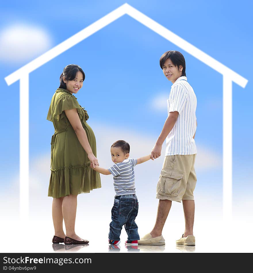 Happy Family and home concept with parents and son looking at the camera