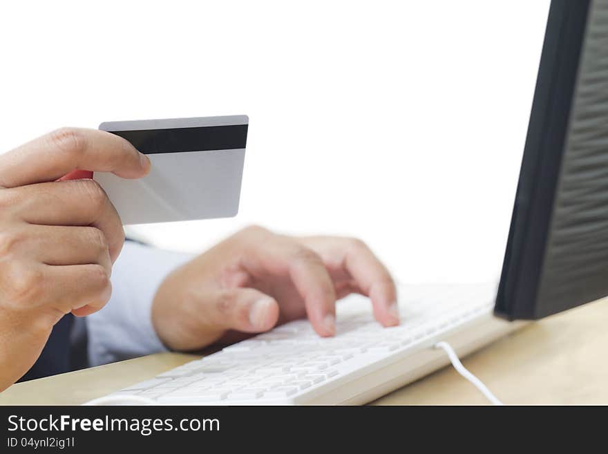 Business man paying online with his credit card