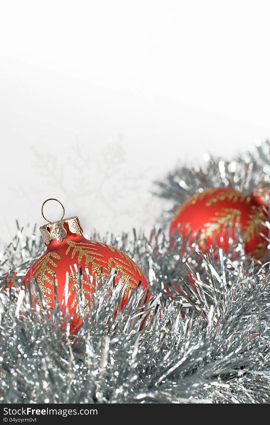 Christmas balls and snowflakes on tinsel