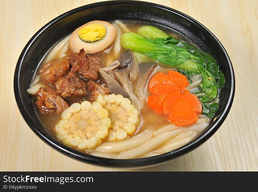 Chinese noodles with egg and vegetables. Chinese noodles with egg and vegetables