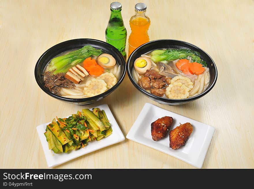 Chinese noodles with egg and vegetables，Soda and vegetable salad. Chinese noodles with egg and vegetables，Soda and vegetable salad