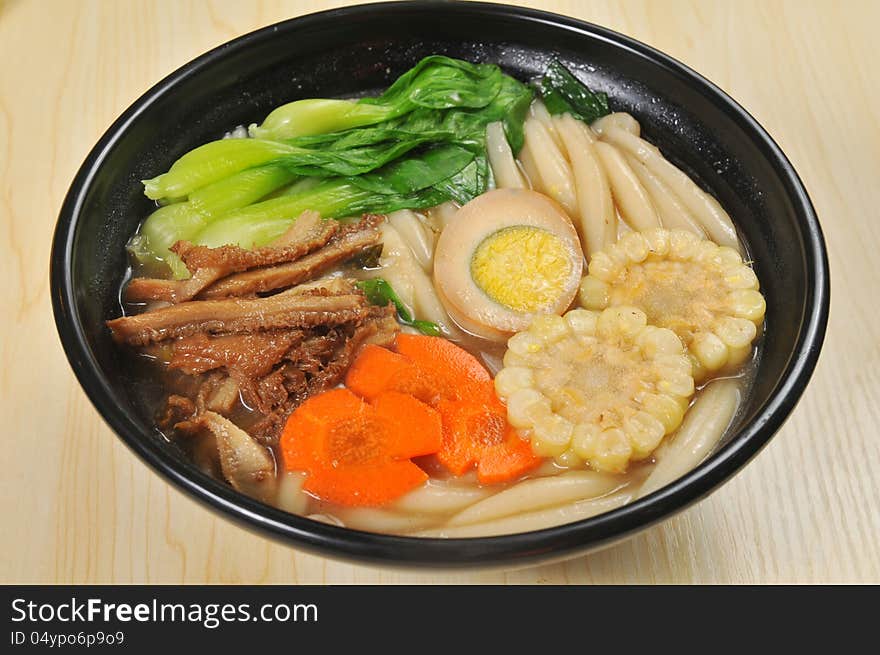 Chinese noodles with egg and vegetables. Chinese noodles with egg and vegetables