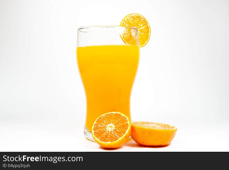 Orange juice and slice on white background