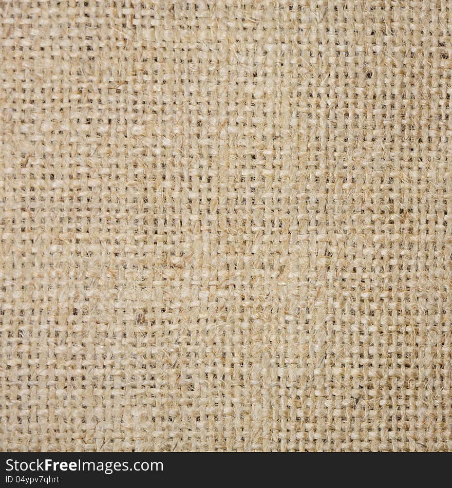 Coarse brown fabric in country style closeup