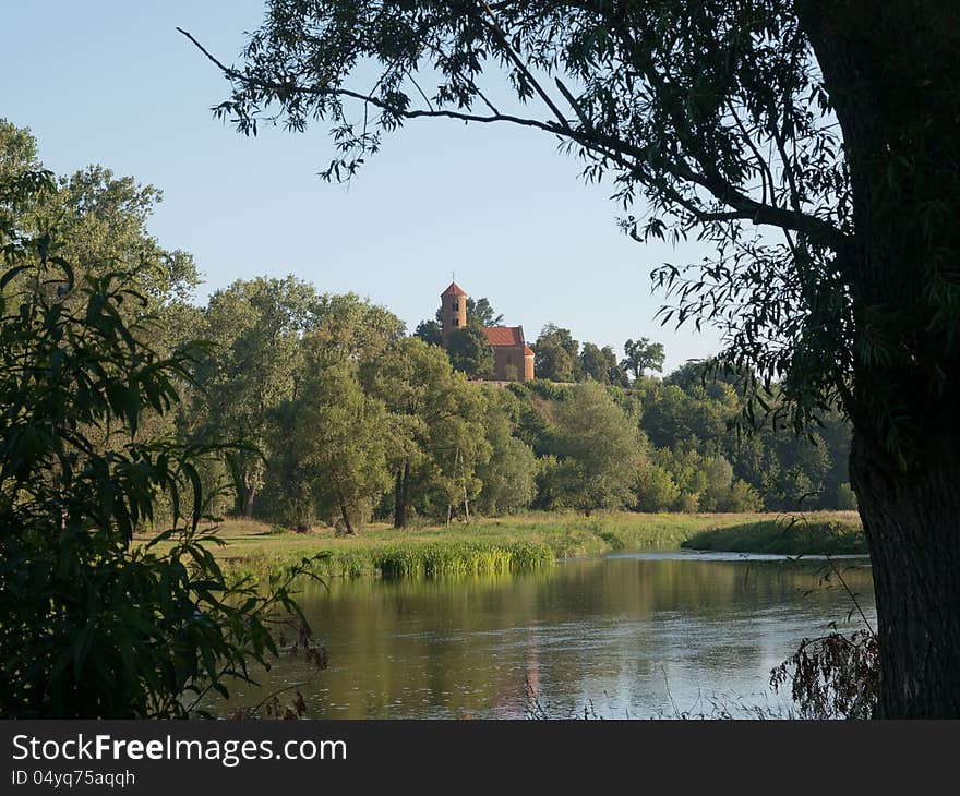 St.Giles Church beyond the Pilica river. St.Giles Church beyond the Pilica river