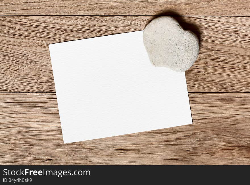 Greeting card with a heart-shaped stone