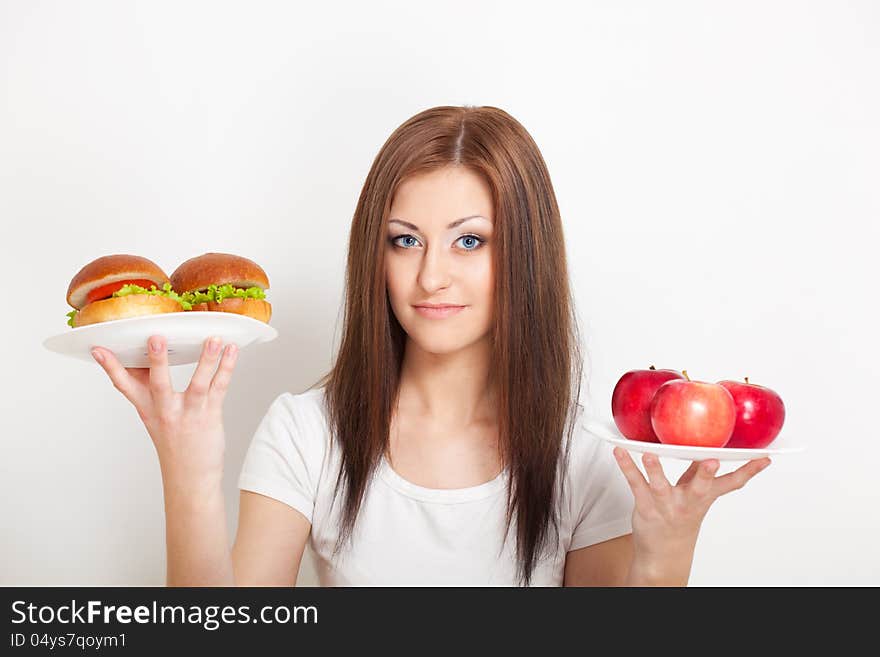 Woman Sitting Behind The Table With Food