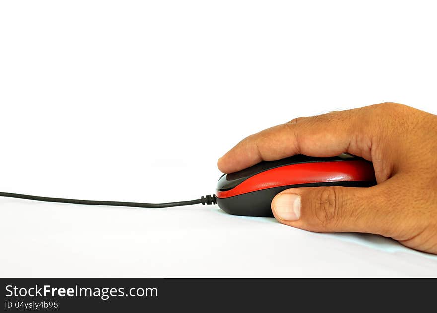 A computer mouse being operated by hand. A computer mouse being operated by hand.