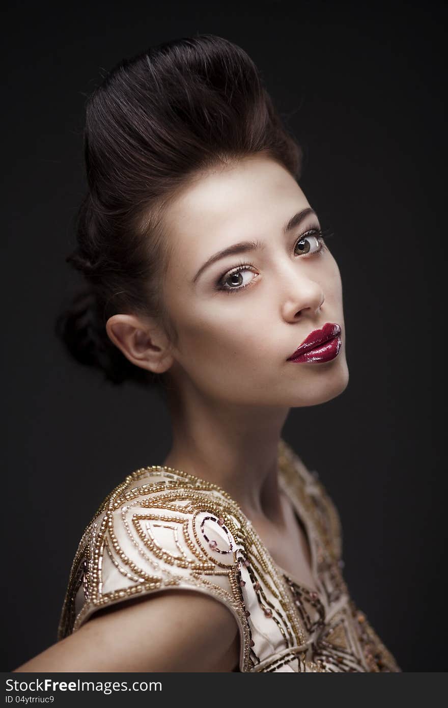 Studio portrait of bright woman in vintage dress. Studio portrait of bright woman in vintage dress