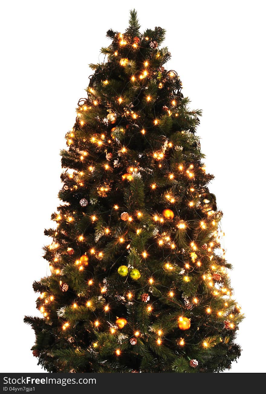 Small christmas tree against white background. Small christmas tree against white background.