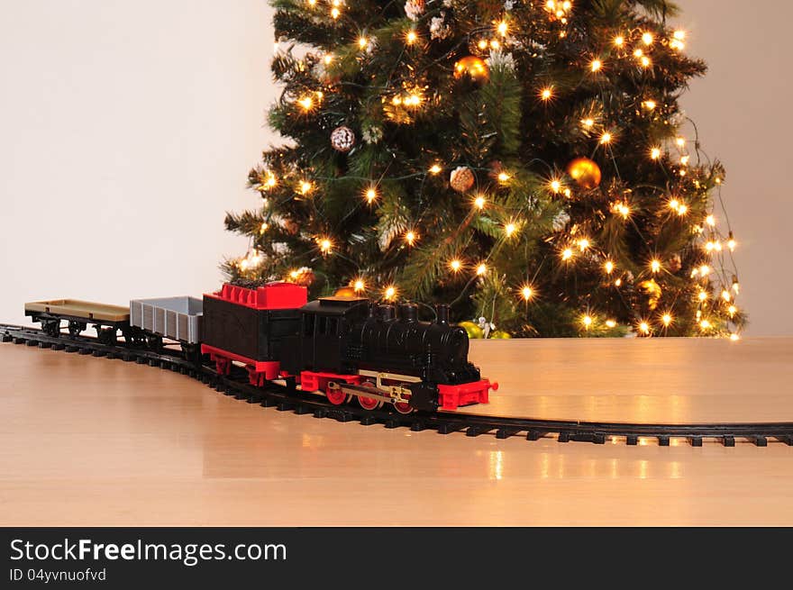 Small christmas tree against white background. Small christmas tree against white background.