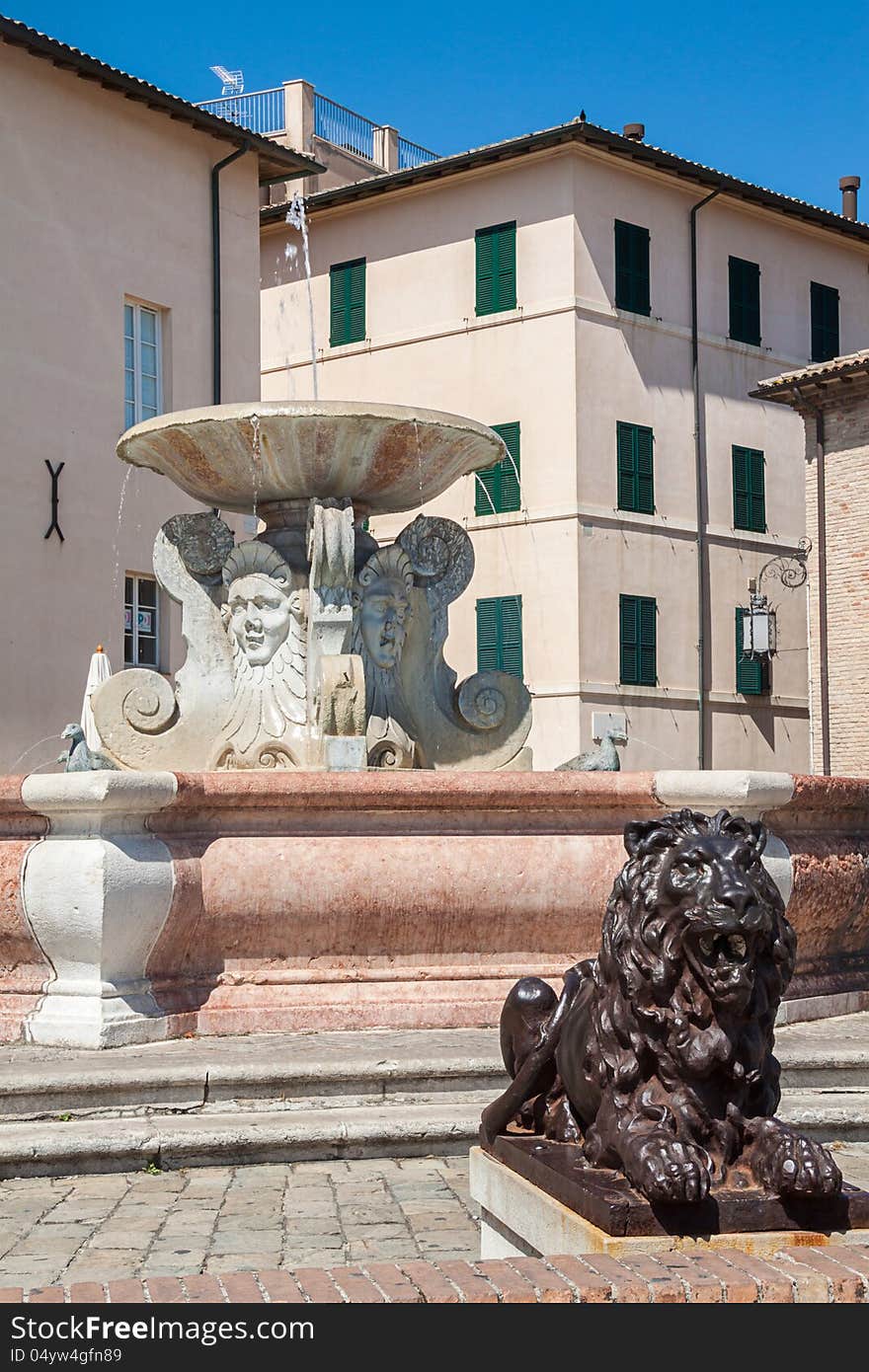 Historic fountain in the square of Senigallia