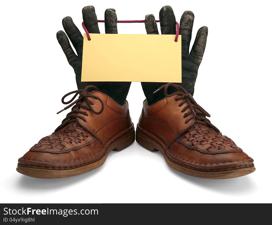 Old orange leather shoes and black leather gloves. Old orange leather shoes and black leather gloves.