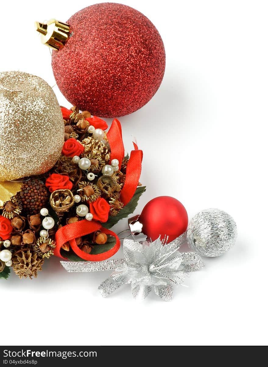 Christmas Decorations with Gold, Red and Silver Baubles and Ribbons isolated on white background