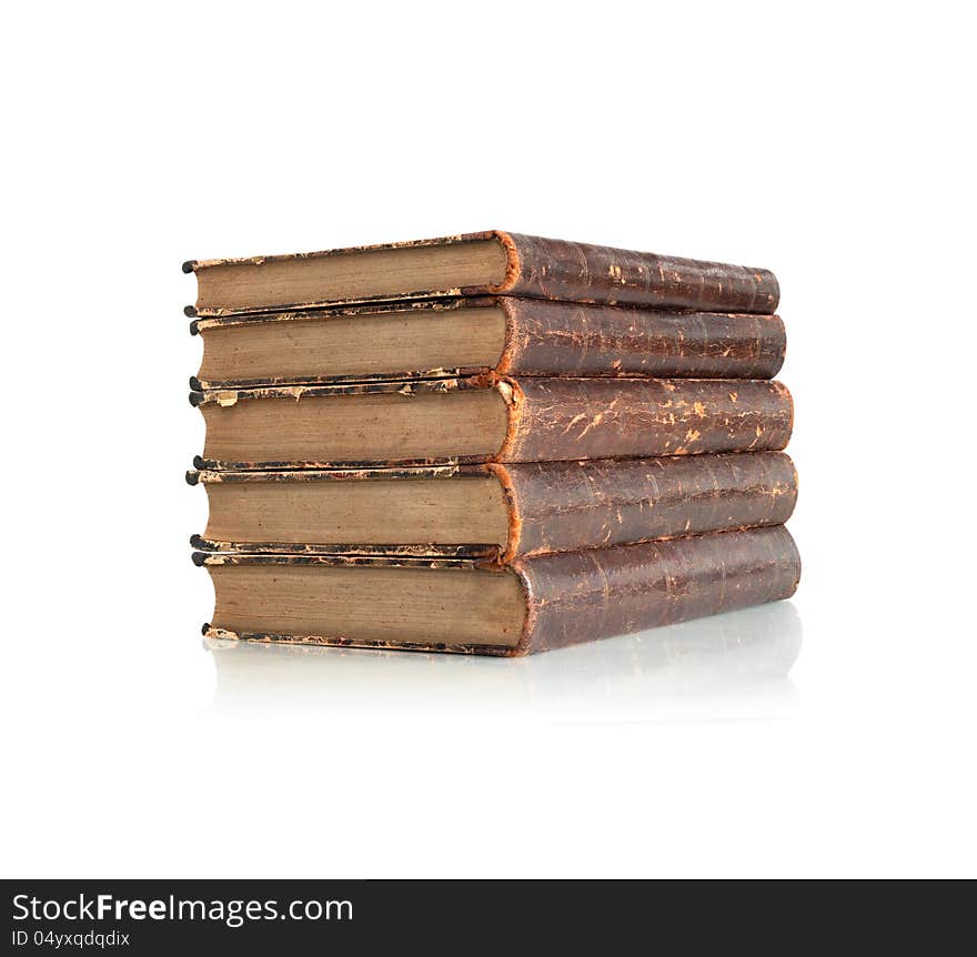 Stack of old books on white background. Clipping path is included. Stack of old books on white background. Clipping path is included