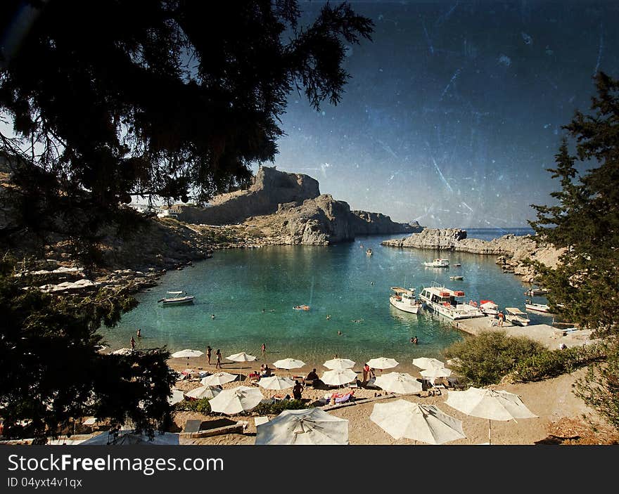 Torquois hidden bay in Rhodes Greece