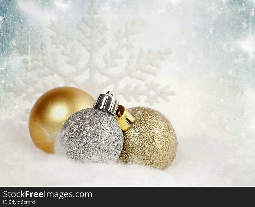 Vintage Christmas background with golden and silver baubles