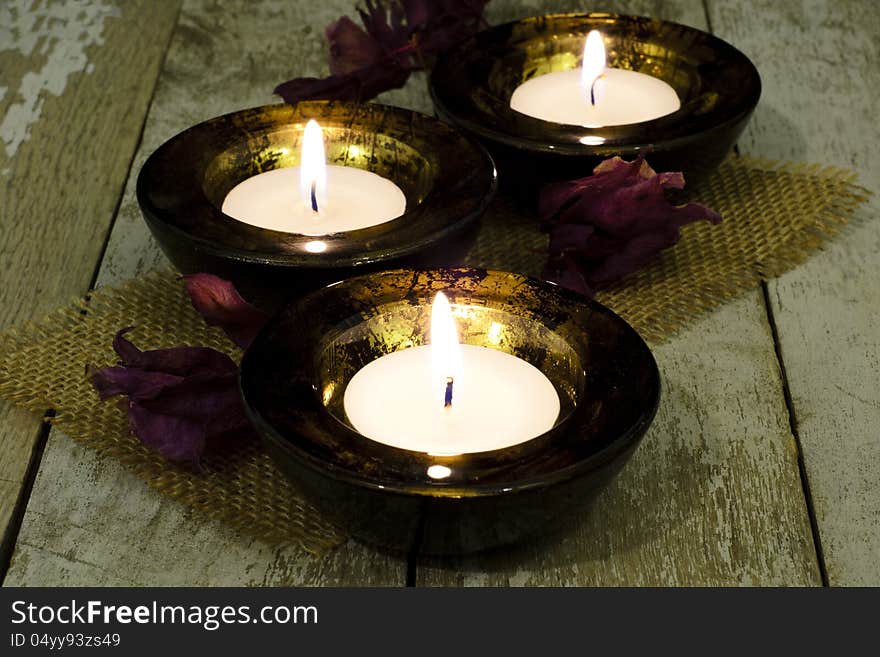 Tea-light still life with dry flower