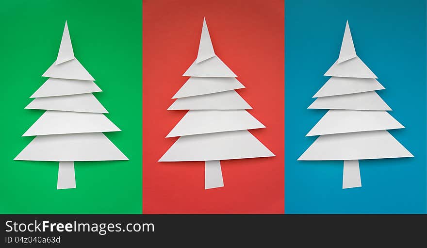 Three Christmas trees made of paper for design