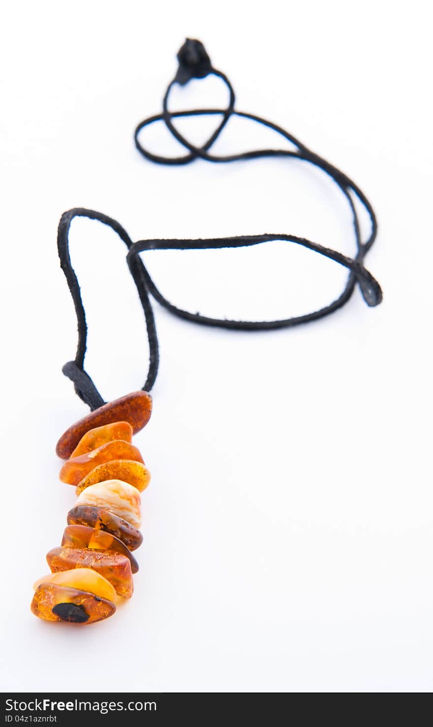 Amber necklace on a white background