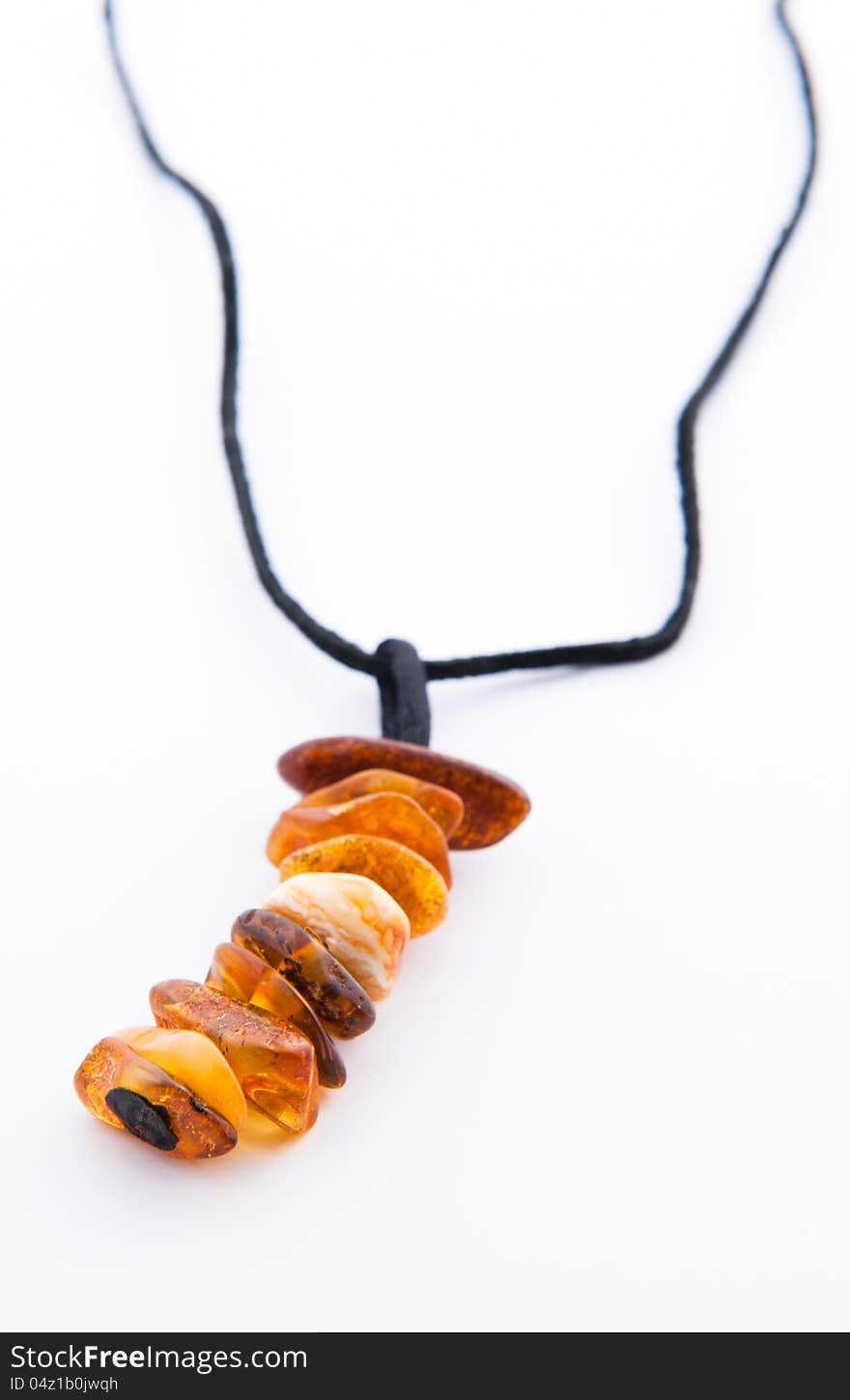 Amber necklace on a white background