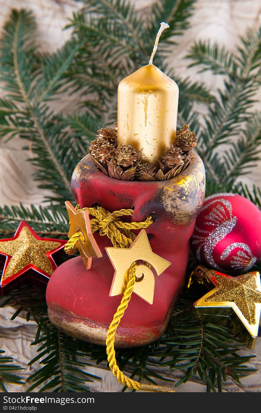 Candle in a shoe christmas ornament