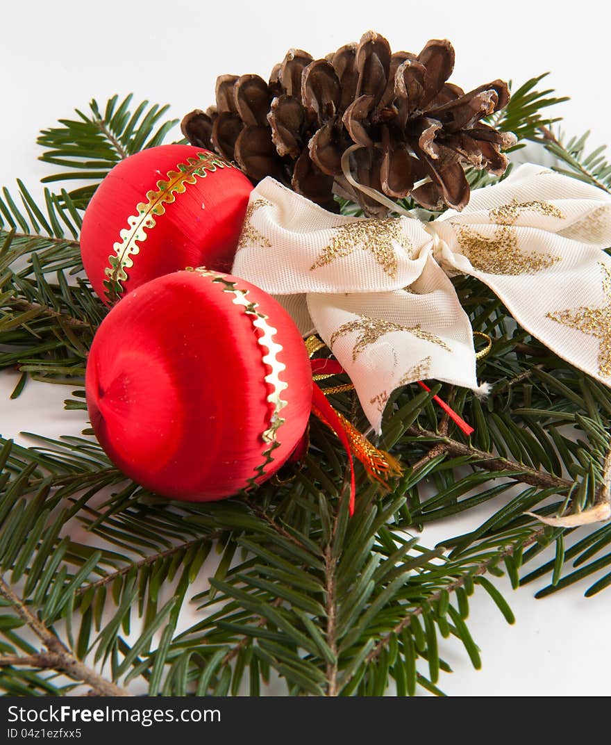 Red baubles with a white and golden bow