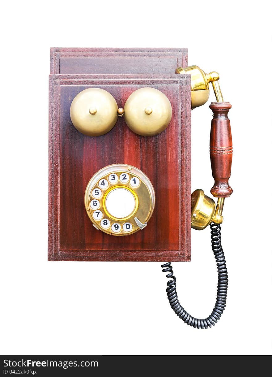 Antique wooden telephone isolated on white background