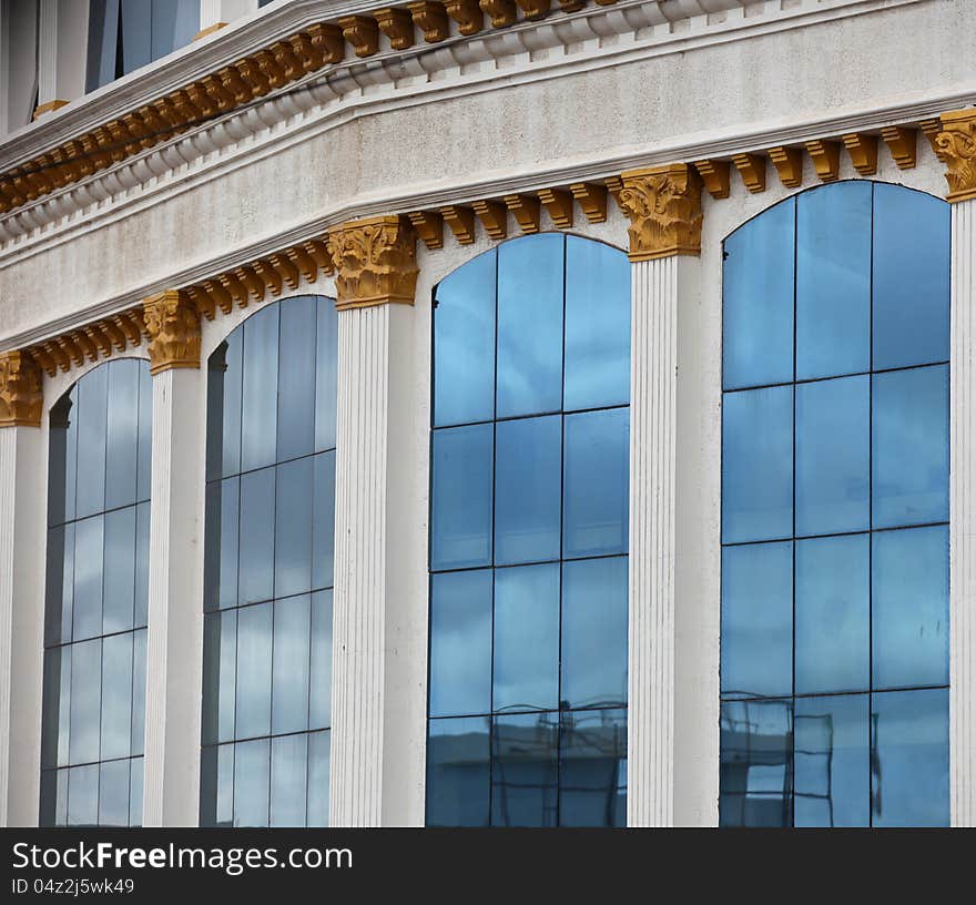 Glass windows of a building with Indian architecture. Glass windows of a building with Indian architecture