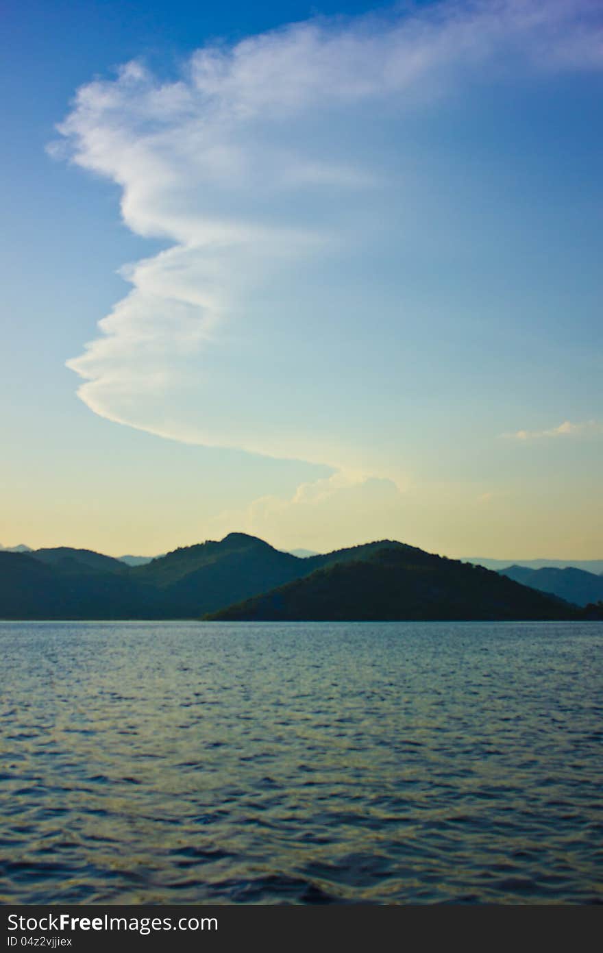 Clouds, mountains, sea