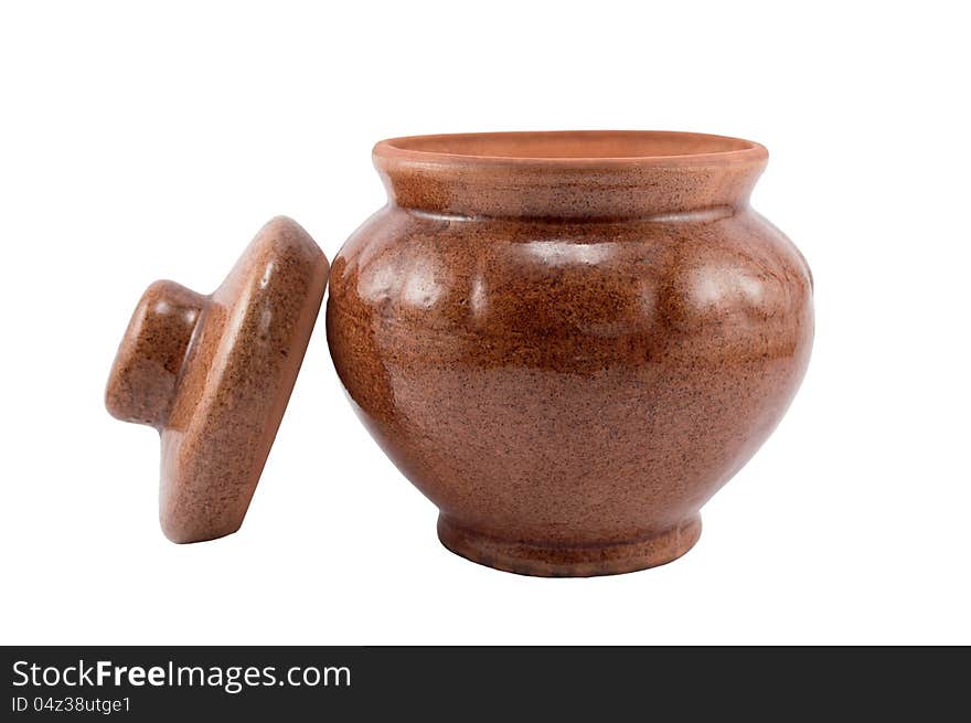 Clay pot with a cover isolated on a white background