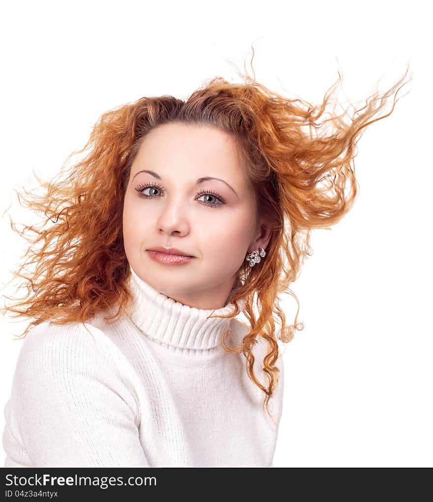 Young attractive girl with flying hair