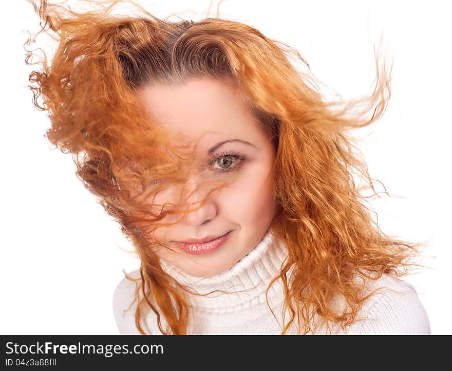 Young attractive girl with flying hair